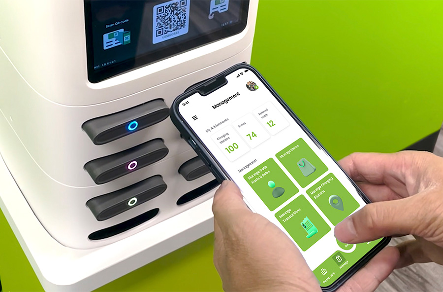 Real GoGo Academy image showing the Host App beside a charging station